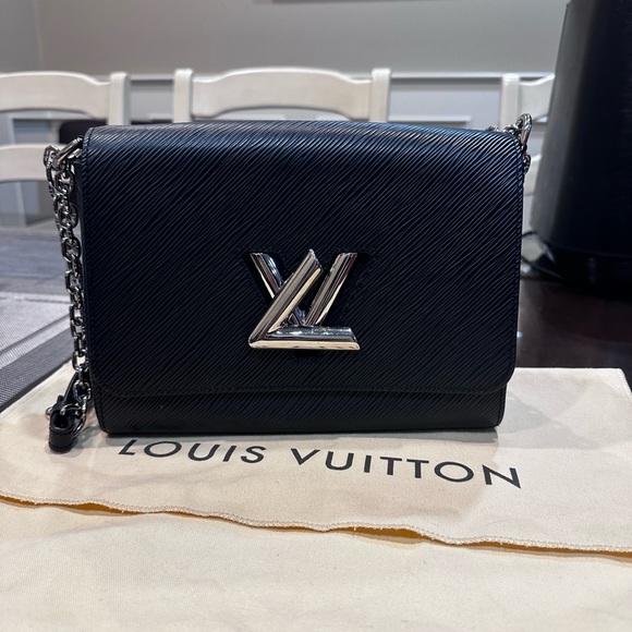 Louis Vuitton Handbags - Louis Vuitton Elegant Black Crossbody with Silver Logo